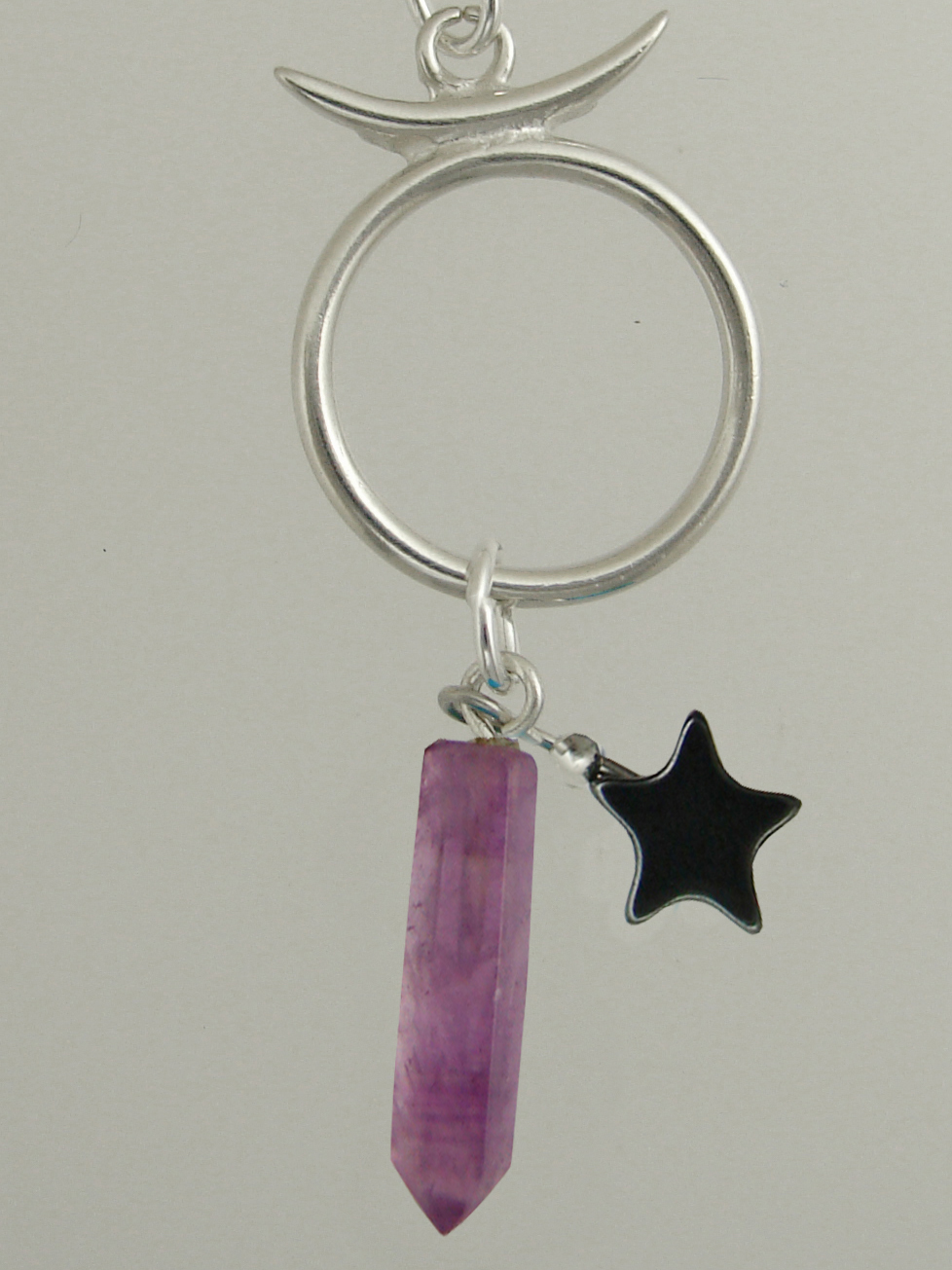 Sterling Silver Taurus Pendant Necklace With an Amethyst Crystal And a Black Onyx Star